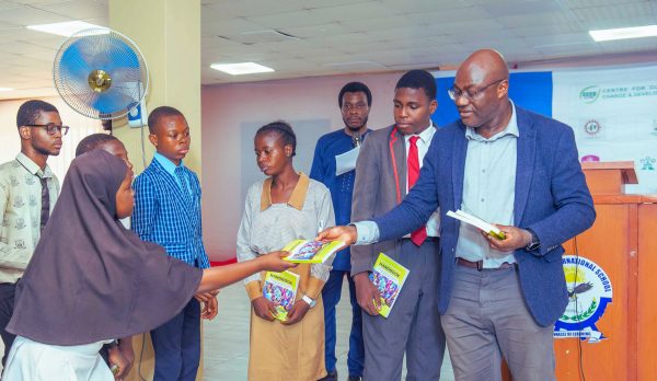 Prof chukwumerije Handing the Climate Edu